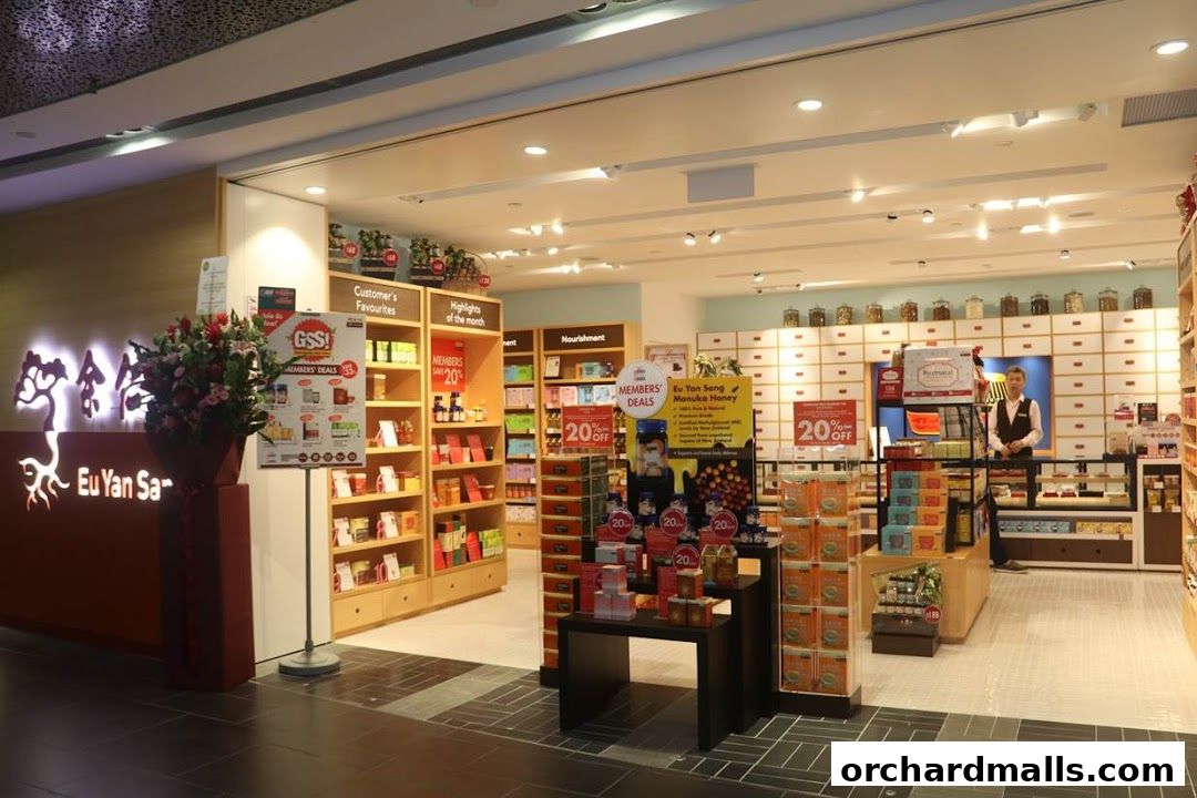 The interior of a Eu Yan Sang shop, showcasing shelves stocked with health products and a staff member at the counter.