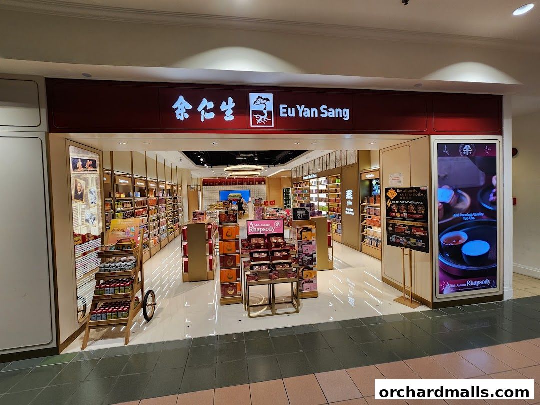 The exterior of the Eu Yan Sang shop, showcasing its products and branding.
