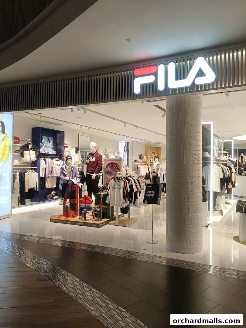 The FILA store front displays mannequins and clothing, with the FILA logo prominently featured.
