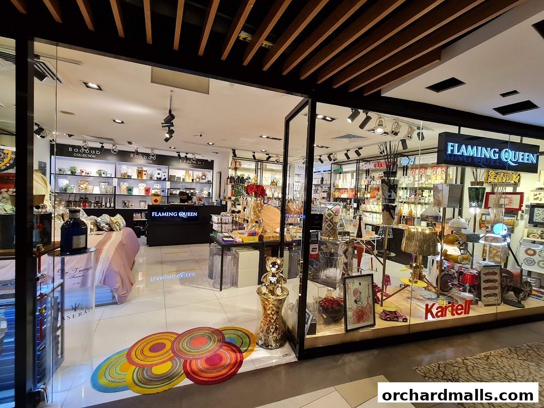 Exterior view of the Flaming Queen shop, showcasing a variety of home decor and luxury items.