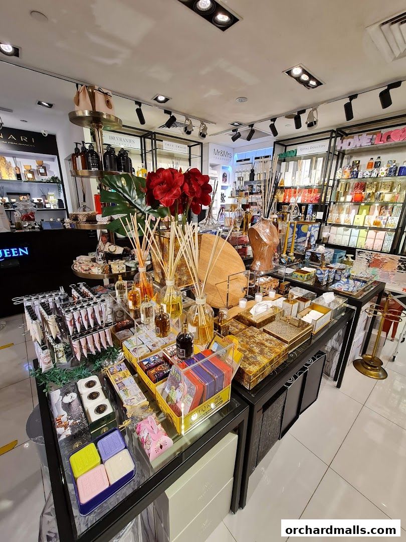 Interior view of a shop displaying various home fragrance and gift items.
