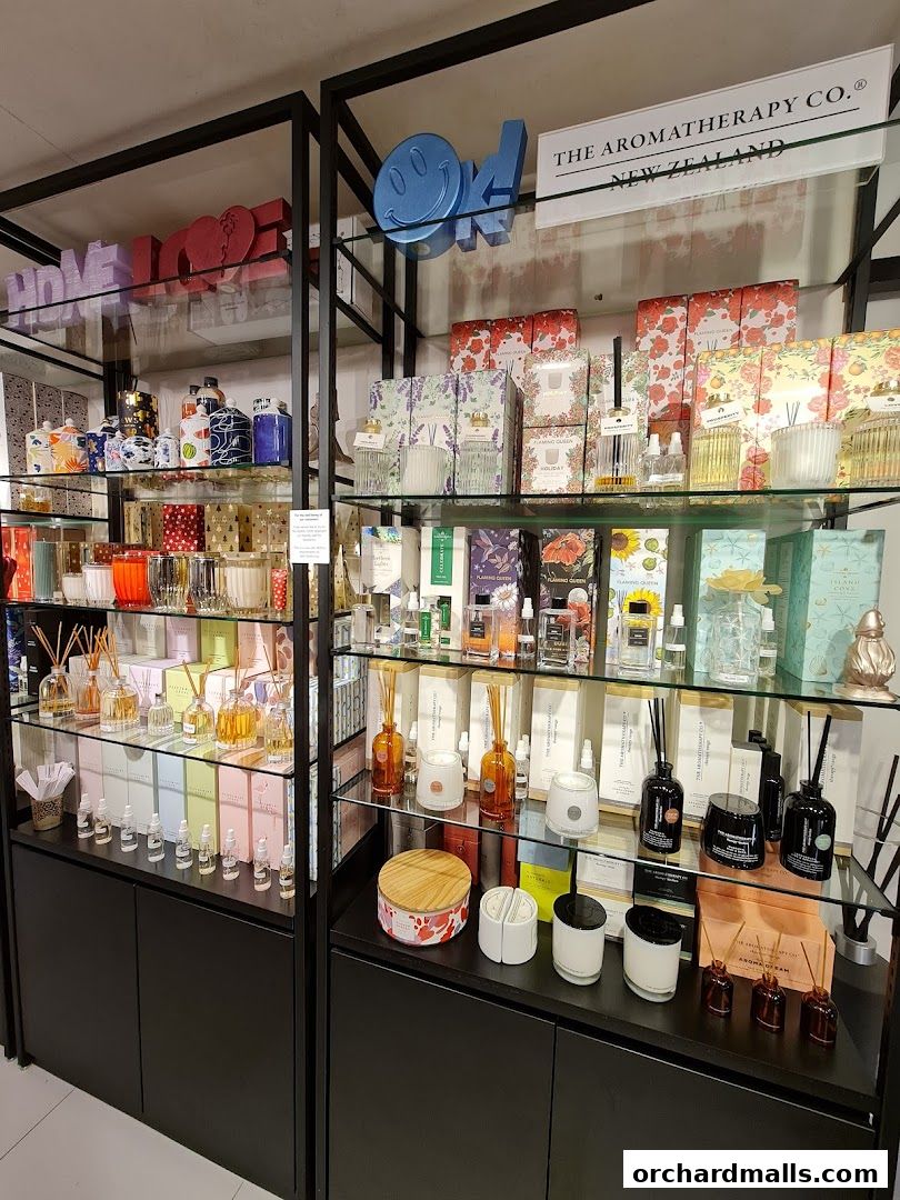 Shelves filled with aromatherapy products, candles, and decorative items.
