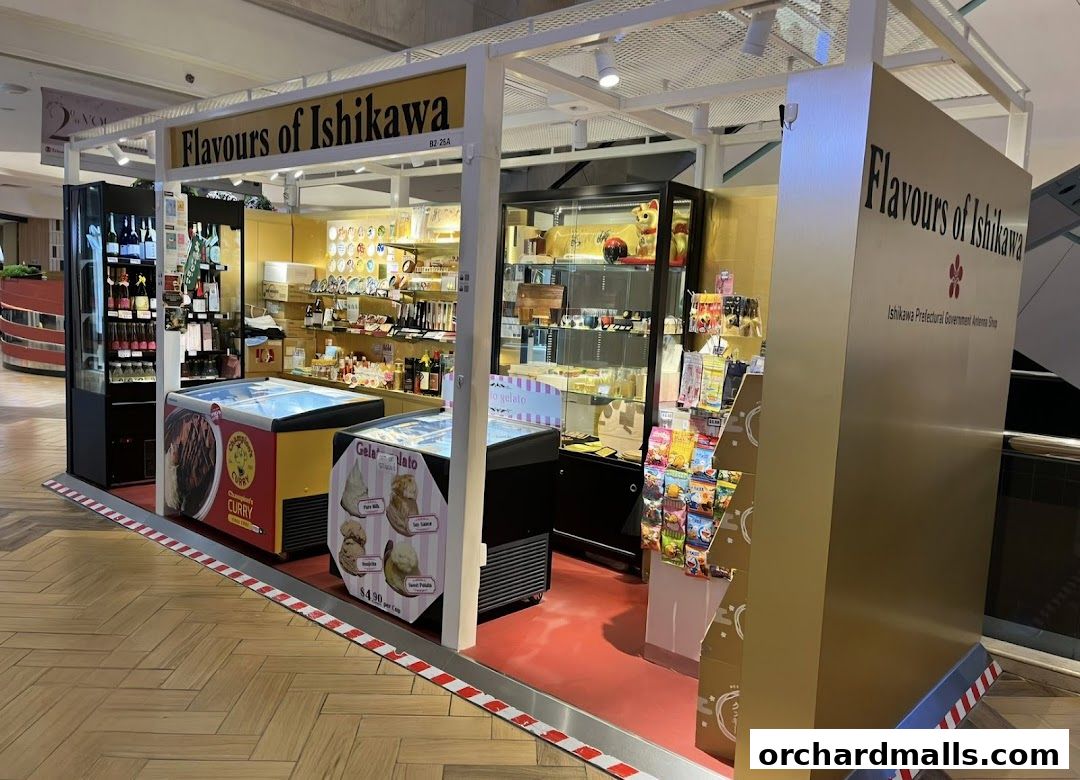 A retail kiosk named 'Flavours of Ishikawa' selling various Japanese products and gelato.