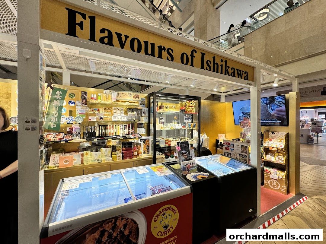 A retail stall named 'Flavours of Ishikawa' selling Japanese food products and goods.