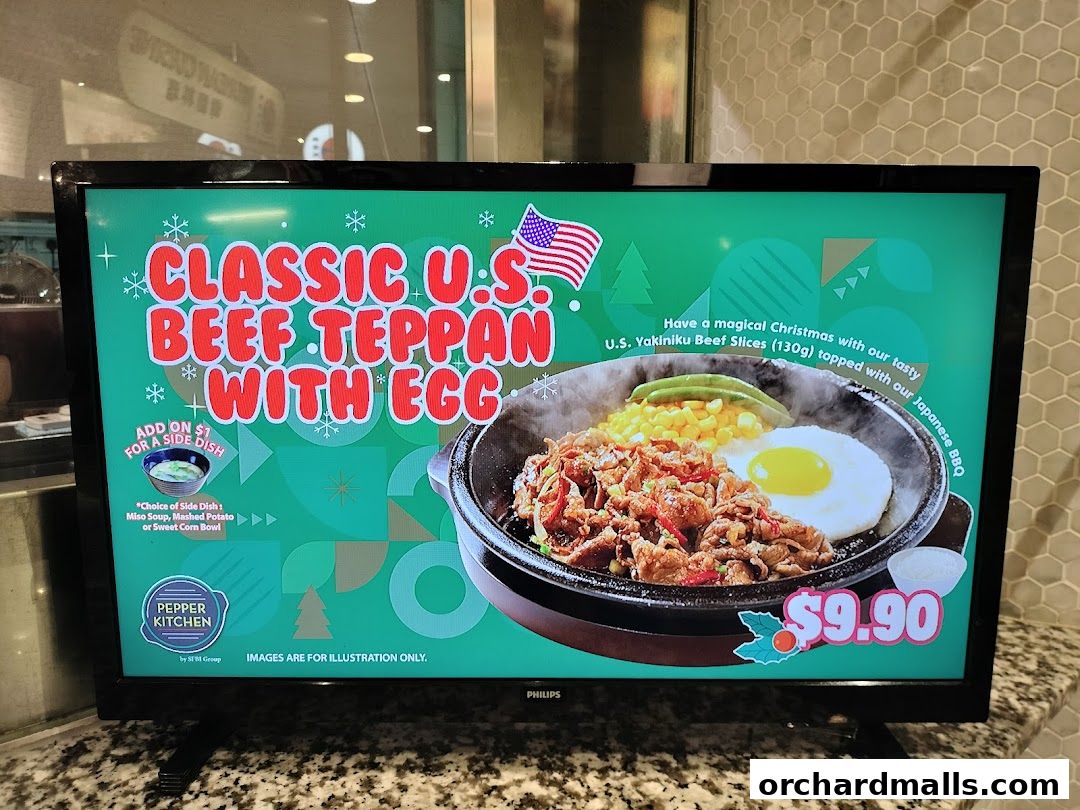 A digital menu board displays a classic U.S. beef teppan with egg dish.