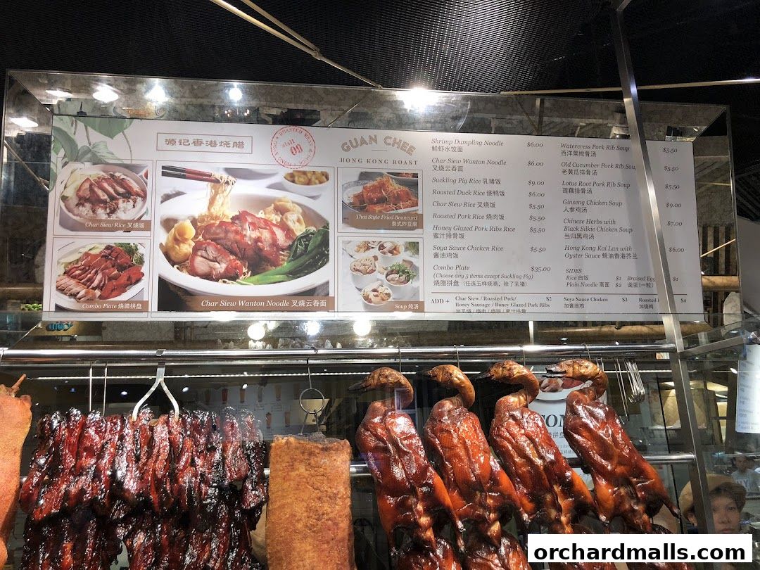 A menu board displaying various Hong Kong roast dishes with prices and images.
