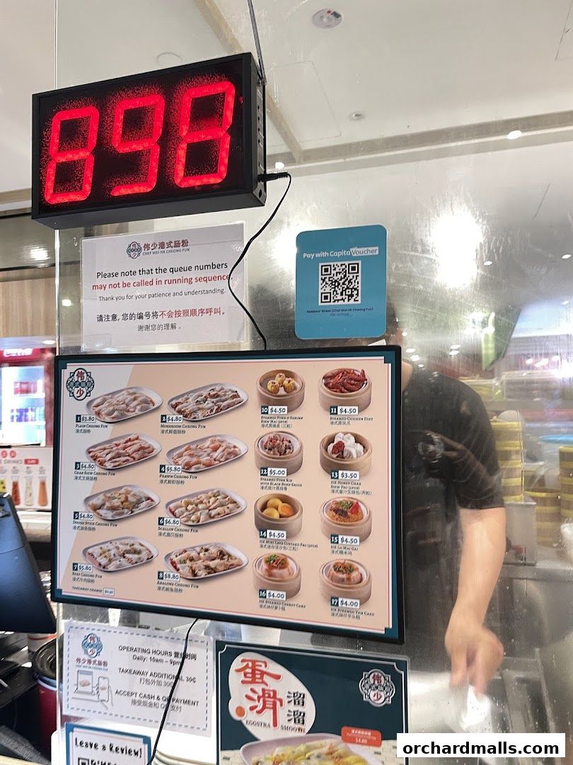 A digital menu displays various dim sum items with prices and images.