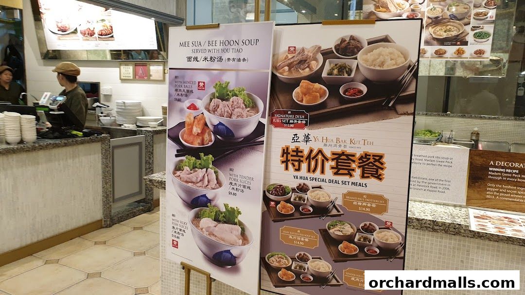 A display of menu boards for Mee Sua/Bee Hoon Soup and Ya Hua Bak Kut Teh.