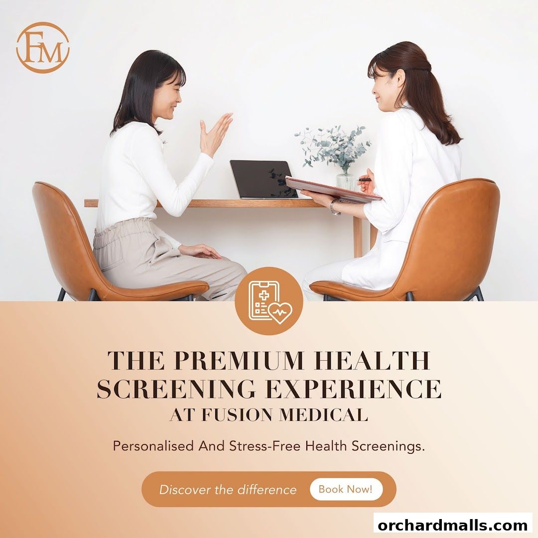Two women are consulting at a desk in a medical office.