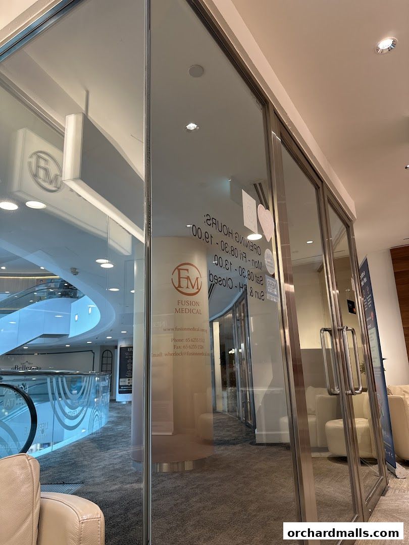 The entrance to Fusion Medical, a clinic with glass doors and signage.