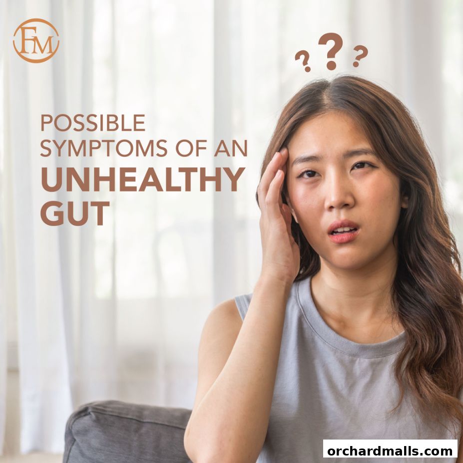 A woman looking concerned with text about possible symptoms of an unhealthy gut.