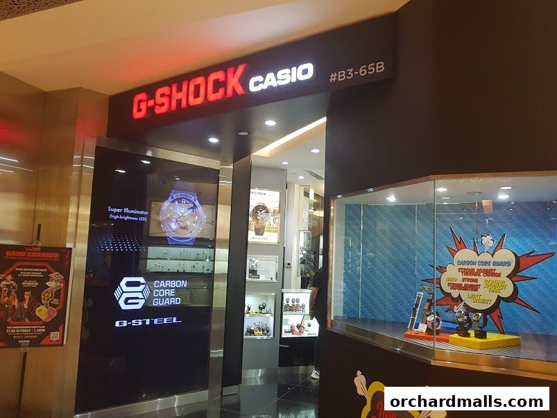 The G-SHOCK CASIO store entrance with illuminated signage and product displays.