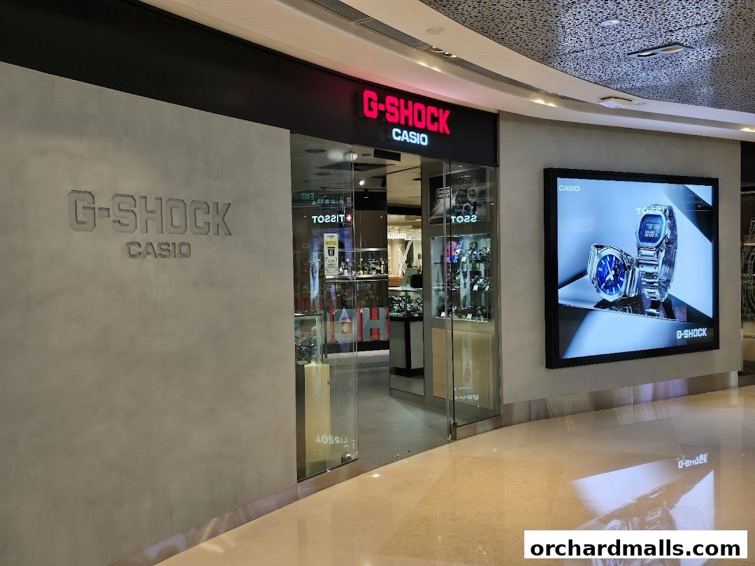 The G-SHOCK CASIO store entrance with a digital display showcasing watches.