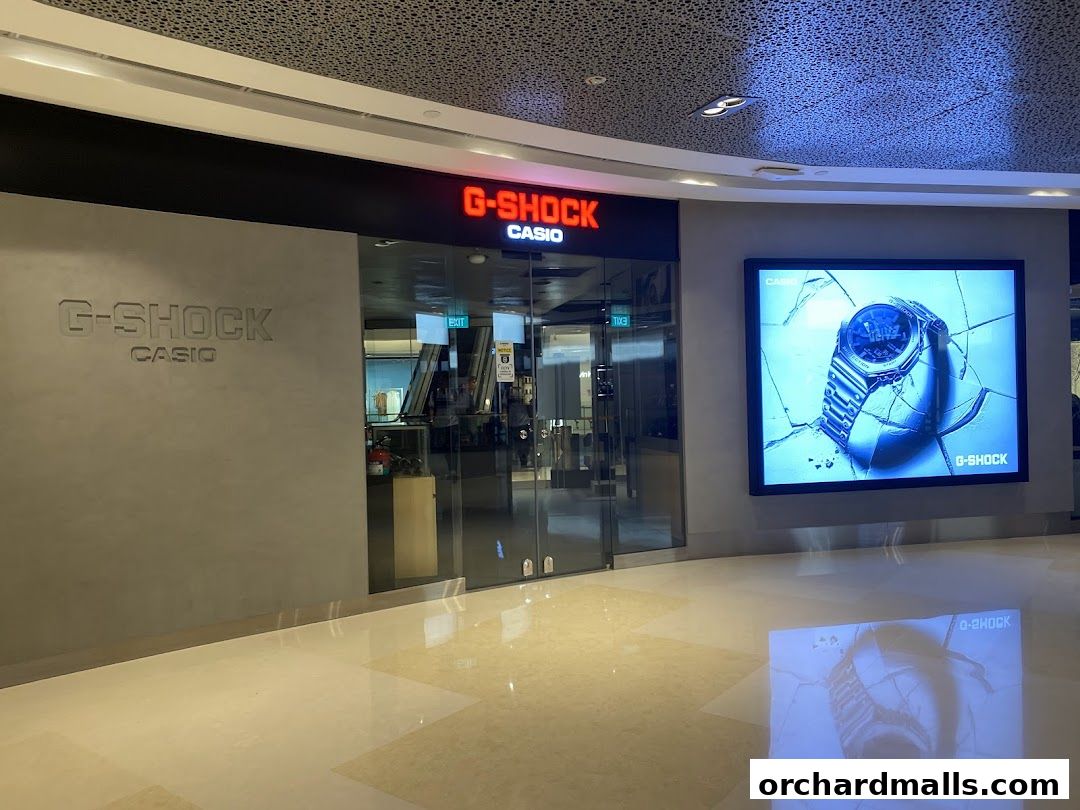 The G-SHOCK CASIO store front with a large digital advertisement for a watch.