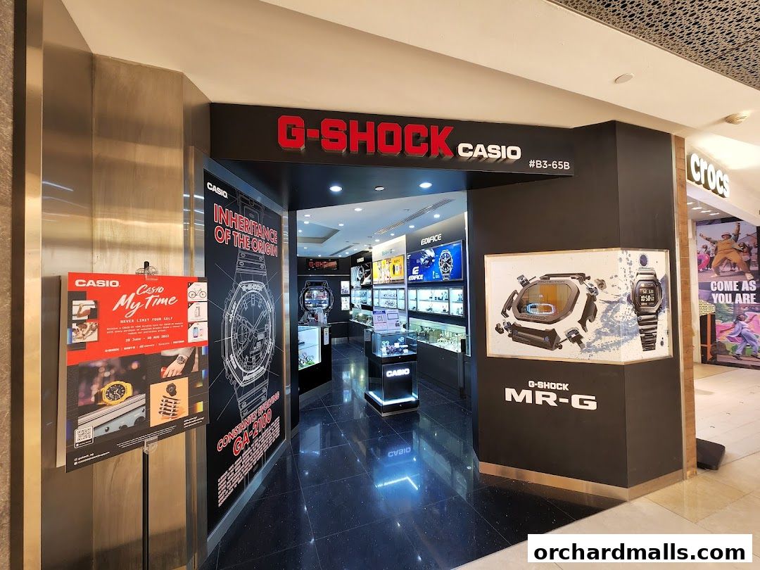 The entrance of a G-Shock Casio store showcasing watches and promotional displays.