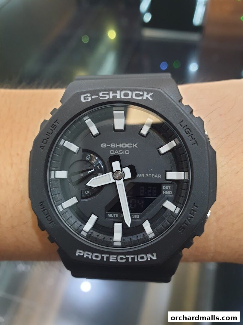 A close-up shot of a black G-Shock Casio watch on a wrist.