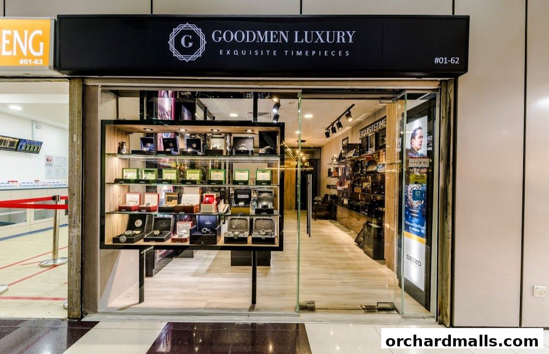 Goodmen Luxury shop front displaying exquisite timepieces on shelves and in display cases.