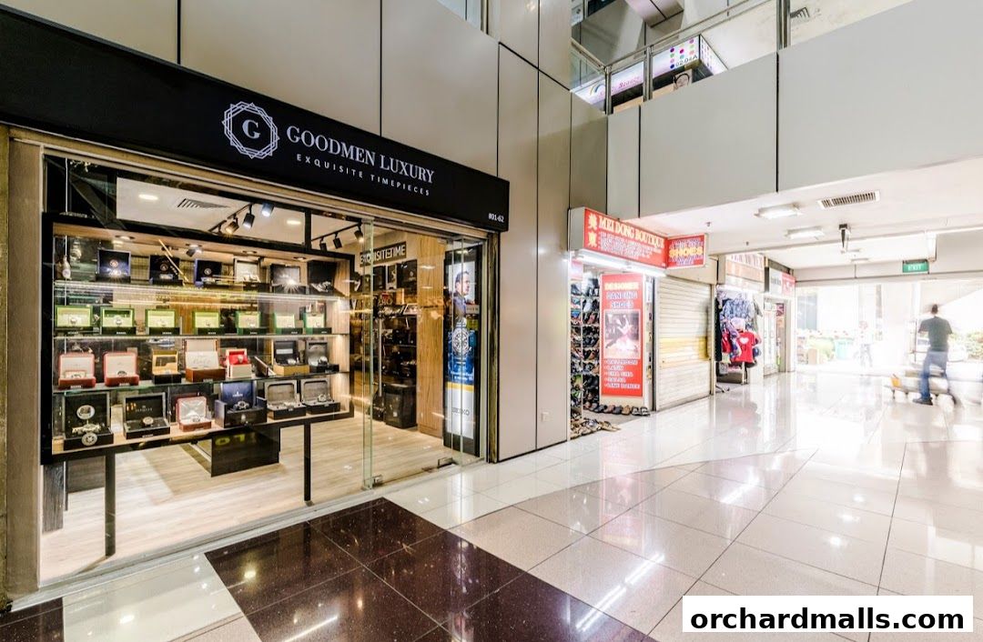 The exterior of Goodmen Luxury, a shop selling exquisite timepieces, with watches displayed in the window.