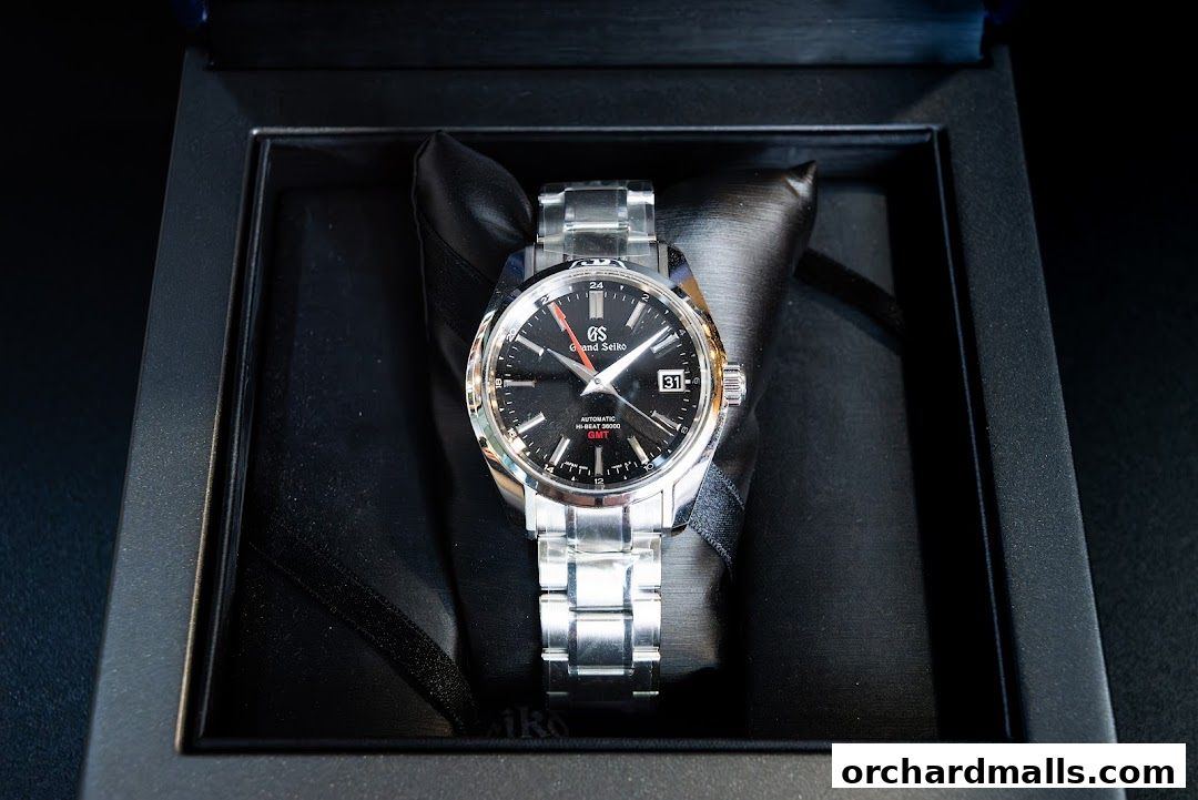 A luxury Grand Seiko automatic Hi-Beat 36000 GMT watch in its presentation box.