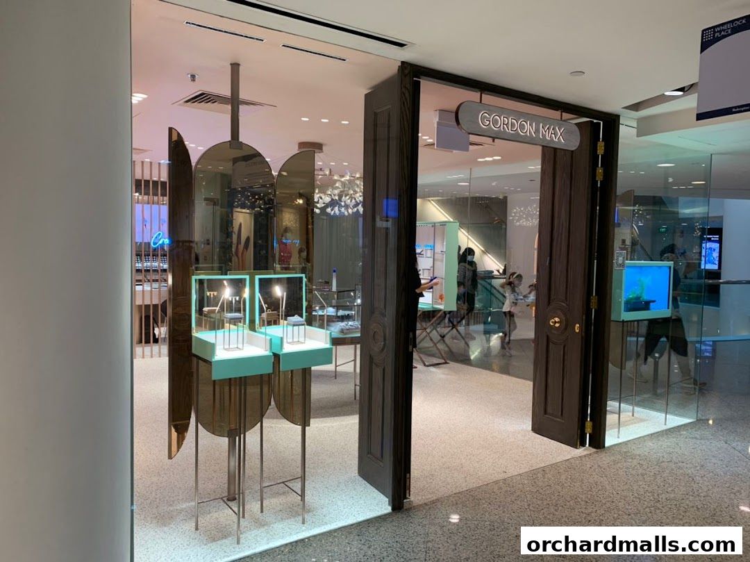 The entrance of Gordon Max, a jewelry store, with display cases and interior visible.