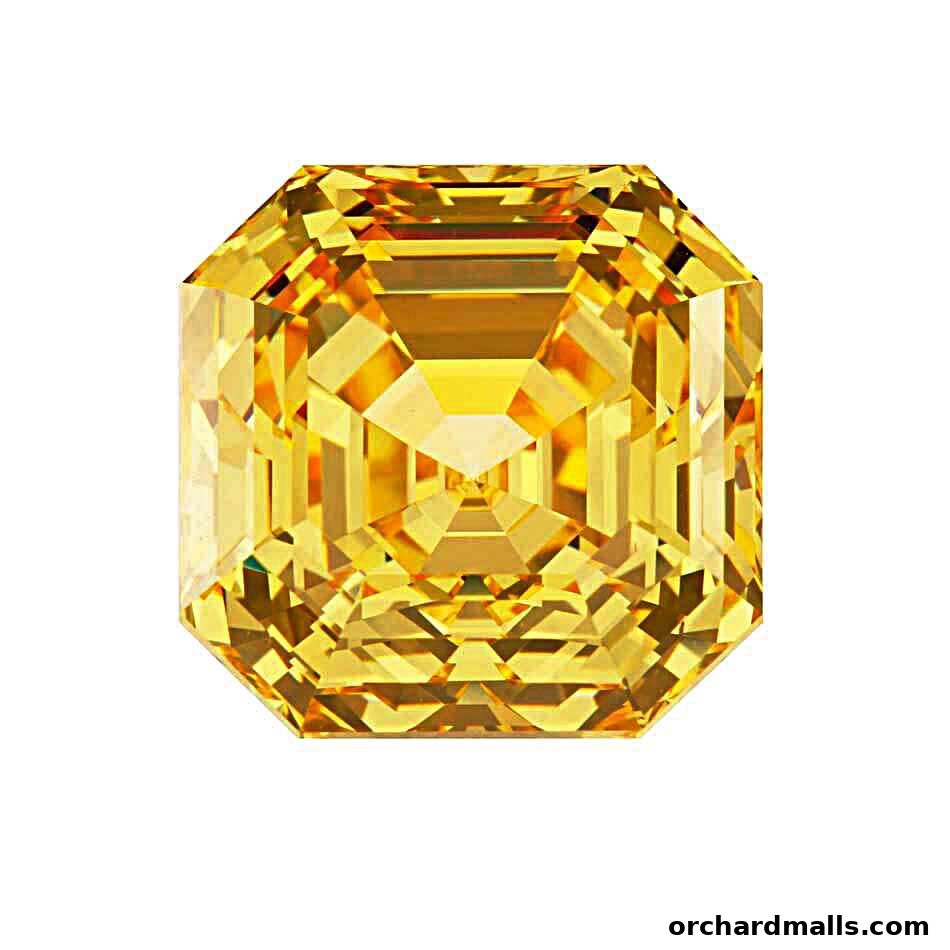 A close-up, isolated image of a radiant, emerald-cut yellow gemstone.