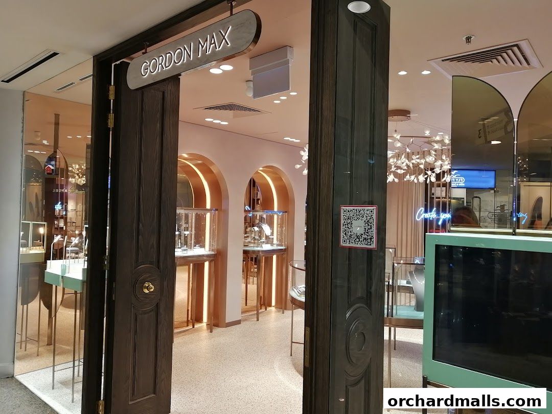 The entrance to the Gordon Max jewelry store, showcasing elegant displays and lighting.