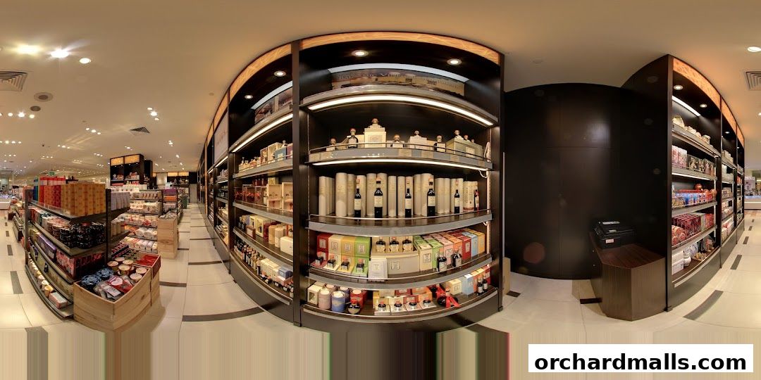Interior view of Gourmet Grocery by OurChoice, showcasing shelves stocked with various food items and beverages.