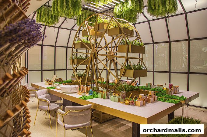 A beautifully decorated retail space with a Ferris wheel display and various beauty products.