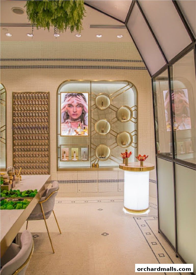 Interior view of a luxurious beauty store with elegant displays and product showcases.