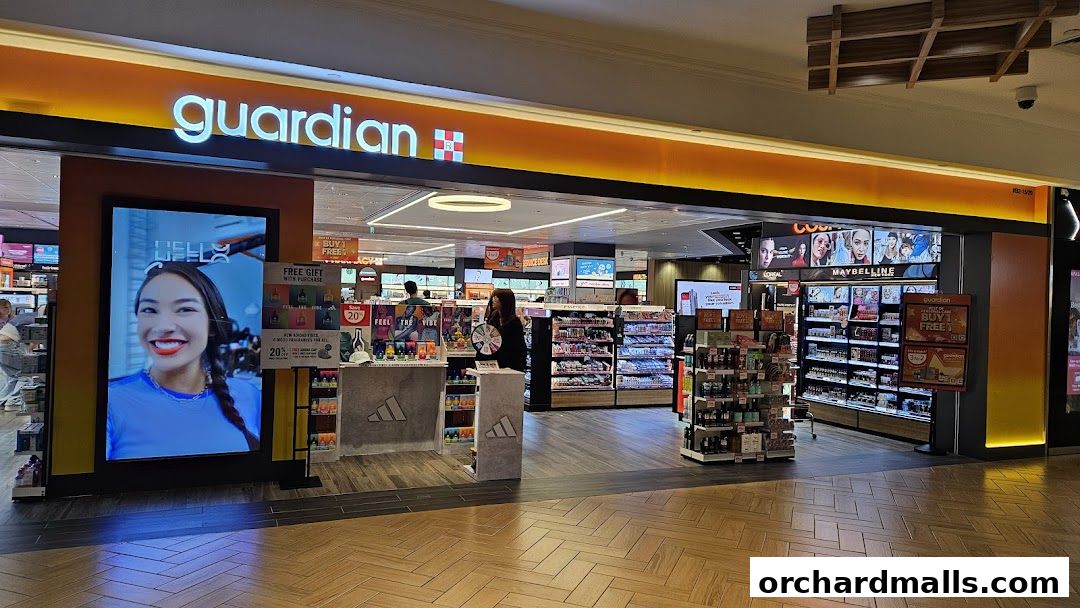 Guardian Health & Beauty Pharmacy store front with bright displays and products.
