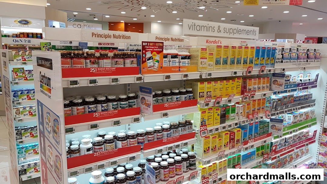 A wide selection of vitamins, supplements, and health products displayed on shelves in a retail store.
