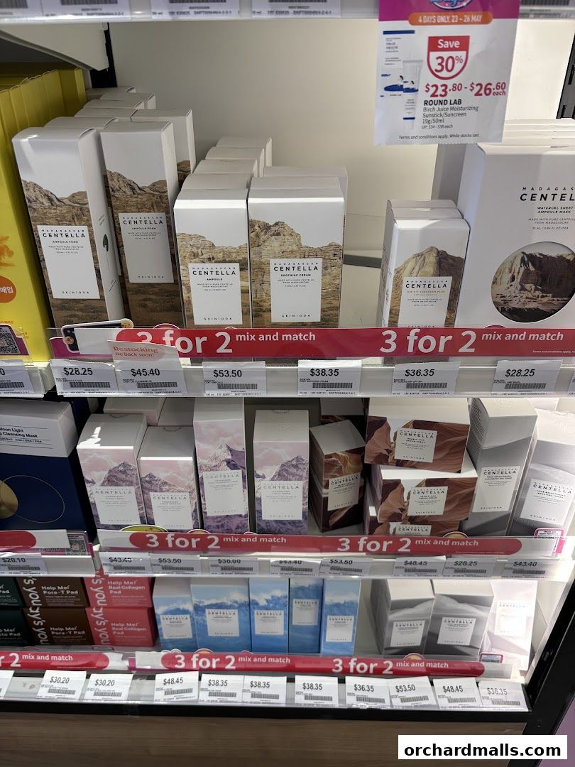 Shelves stocked with various skincare products, primarily featuring Centella.