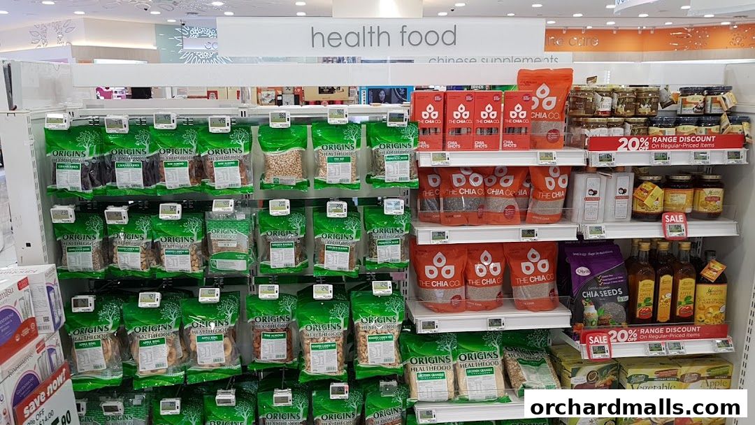 Shelves stocked with various health food products, including nuts, seeds, and dried fruits.