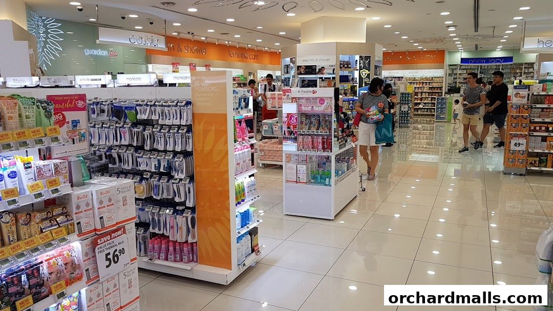 Interior view of a Guardian Health & Beauty Pharmacy with various health and beauty products on display.