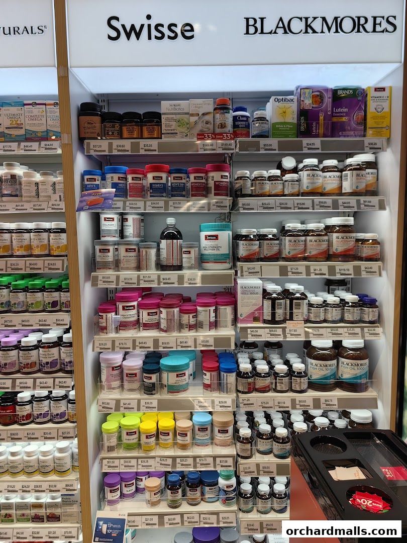 A display of various health supplements from brands like Swisse and Blackmores.