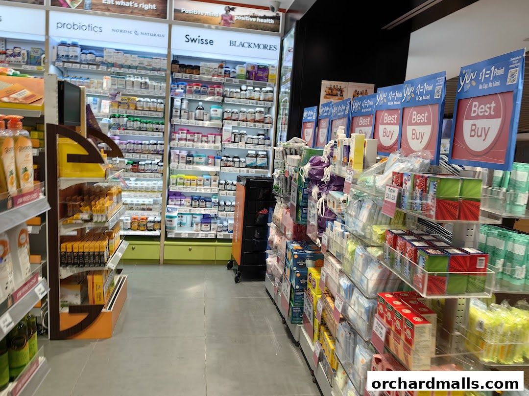 Interior view of a Guardian Health & Beauty store with shelves stocked with vitamins and health products.