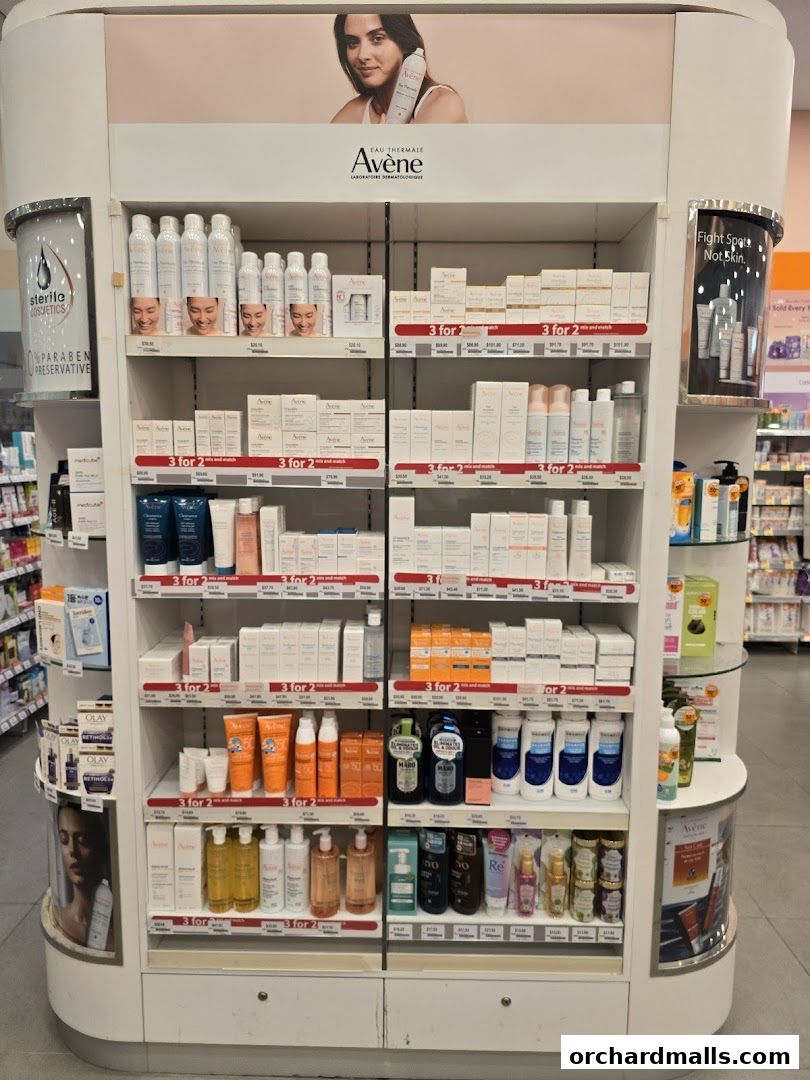 A display of Avene skincare products, including cleansers, moisturizers, and sunscreens.