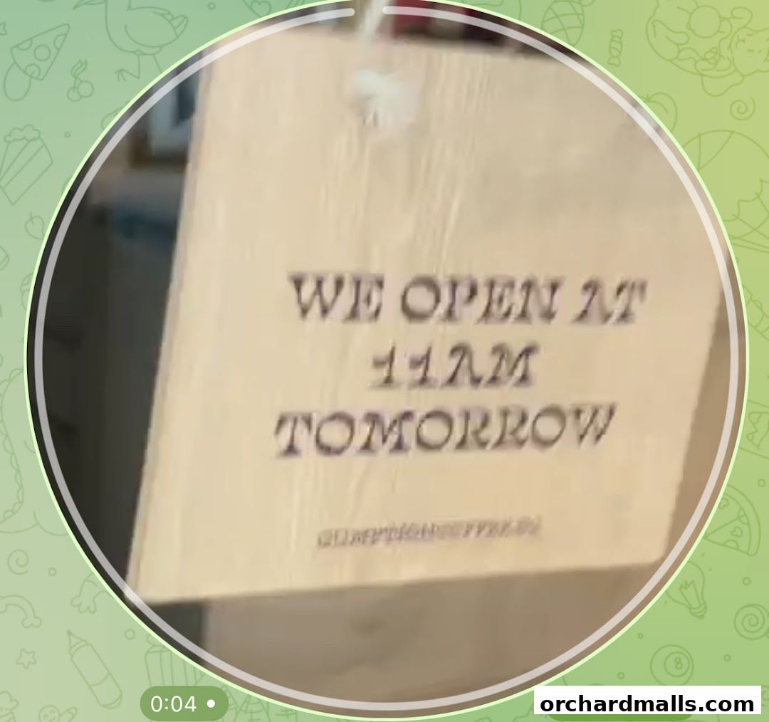 A sign announcing Gumption Coffee will open at 11 AM tomorrow.