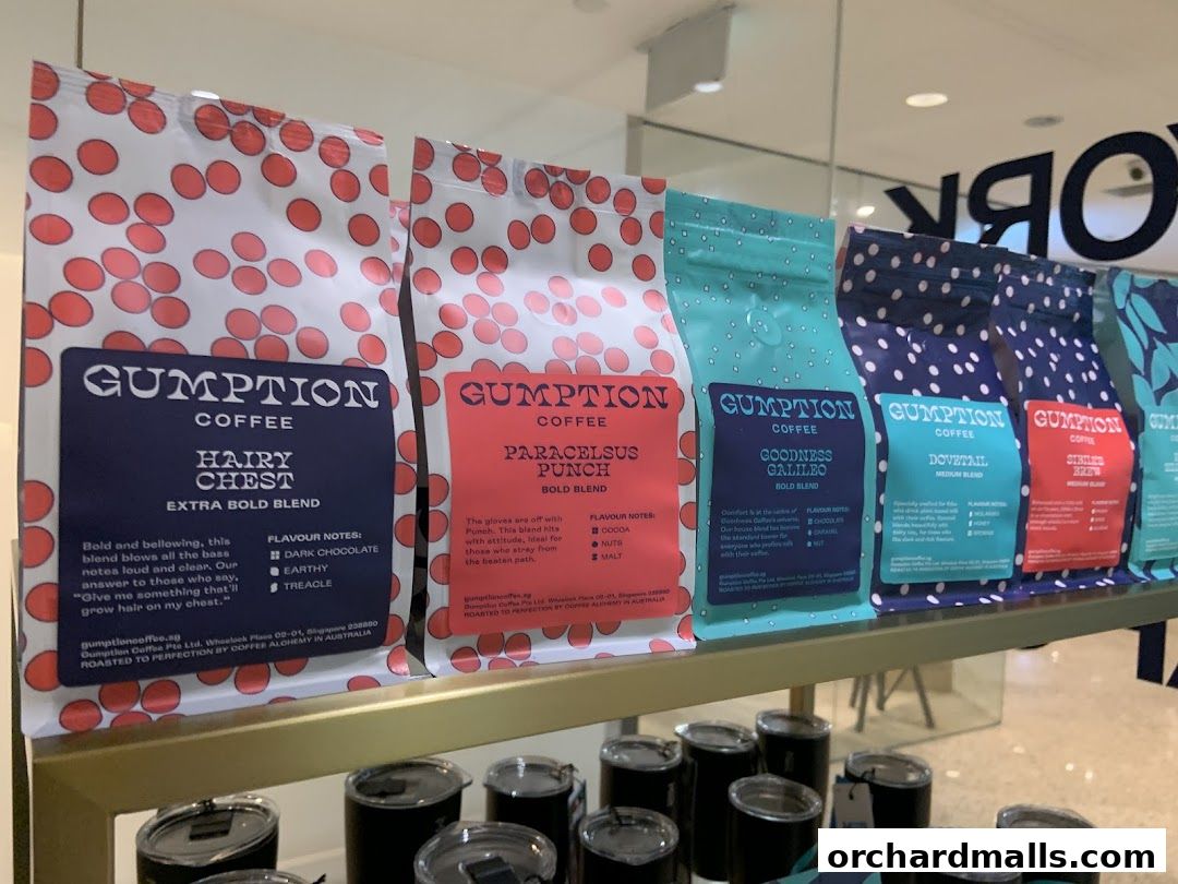 A display of Gumption Coffee bags with various blend names and descriptions.