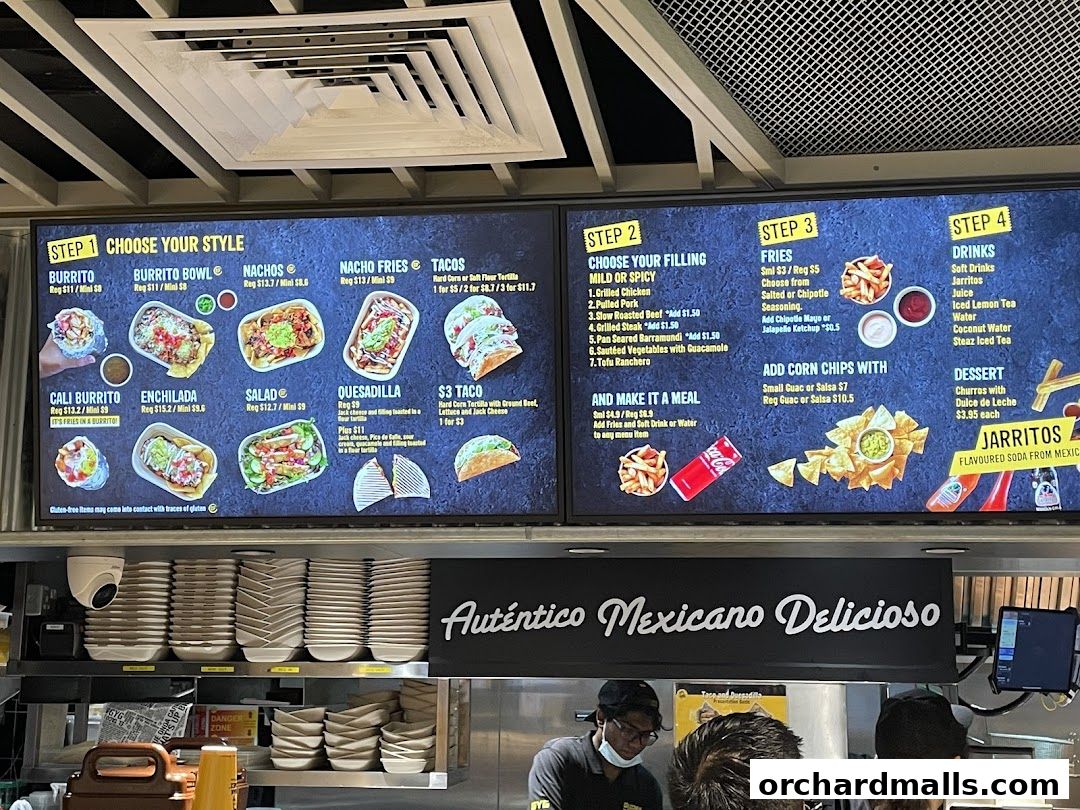 A digital menu board displaying various Mexican food options and their prices.