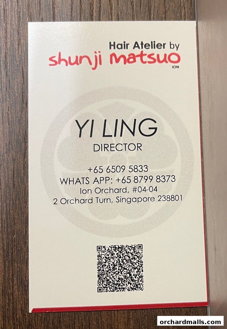 A business card for Yi Ling, Director at Hair Atelier by Shunji Matsuo.