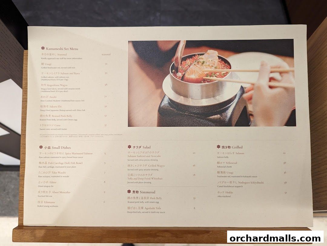 A Japanese restaurant menu featuring set meals, small dishes, salads, grilled, and simmered items.