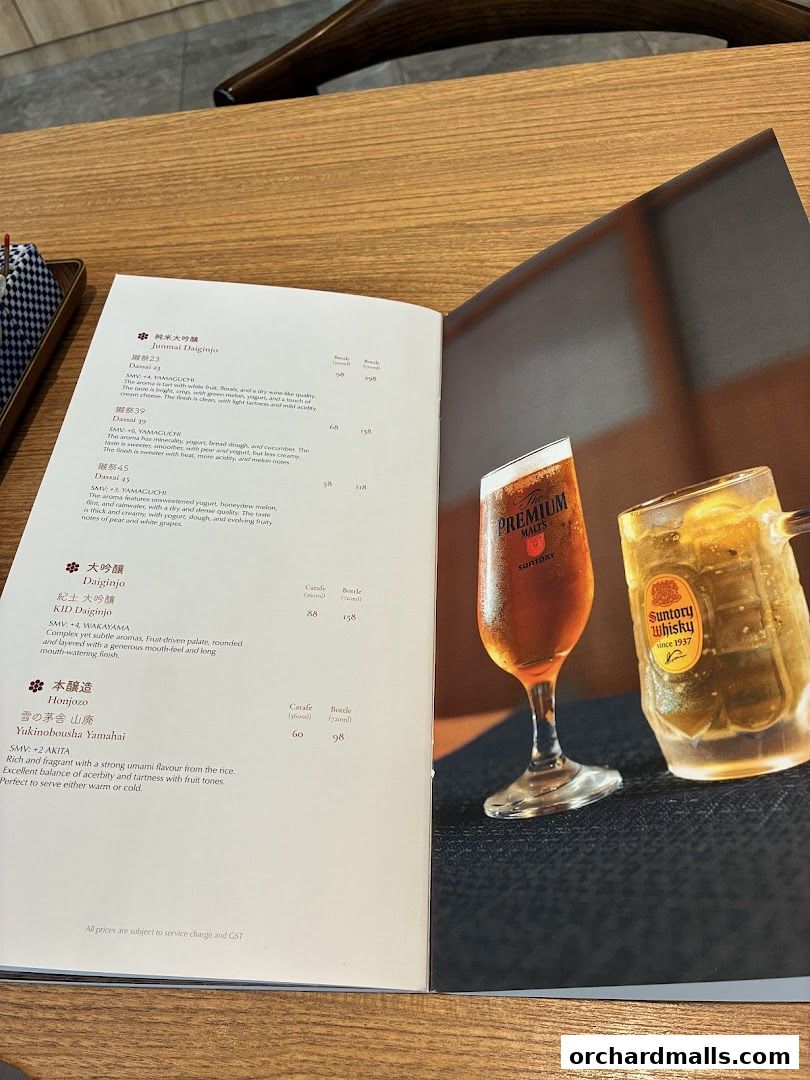 A menu from Hanare featuring sake and whisky with accompanying images.
