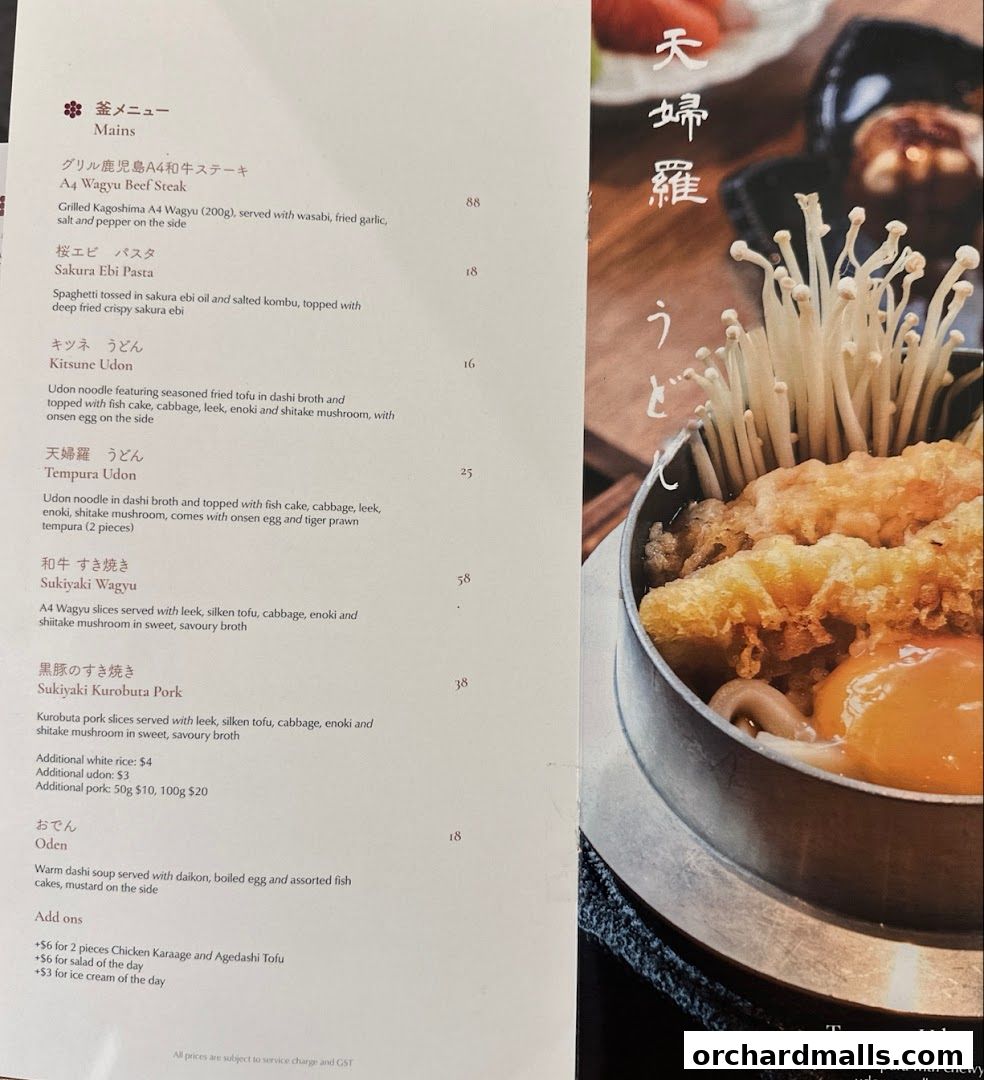 A menu from Hanare restaurant featuring Japanese dishes like Wagyu steak and udon.