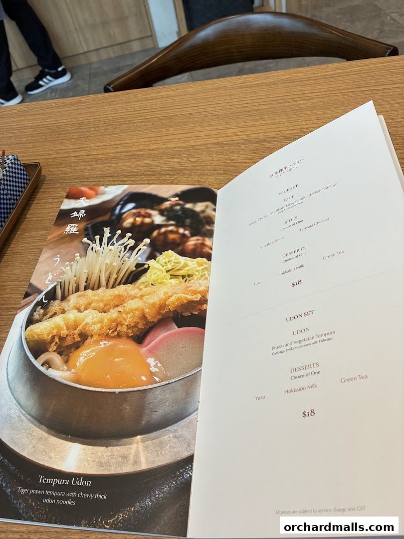 A menu from Hanare restaurant featuring Tempura Udon and Kids Menu options.