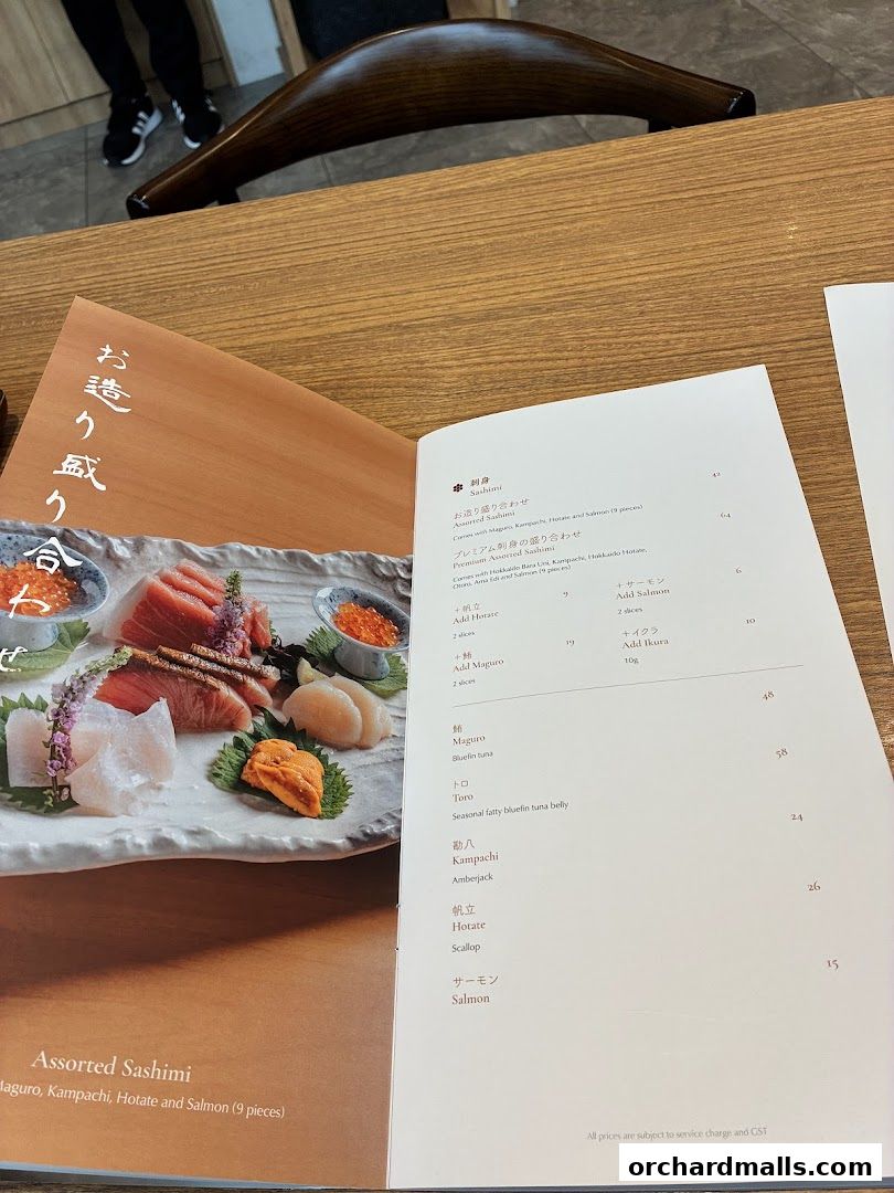 A menu from Hanare featuring assorted sashimi with various fish and seafood.