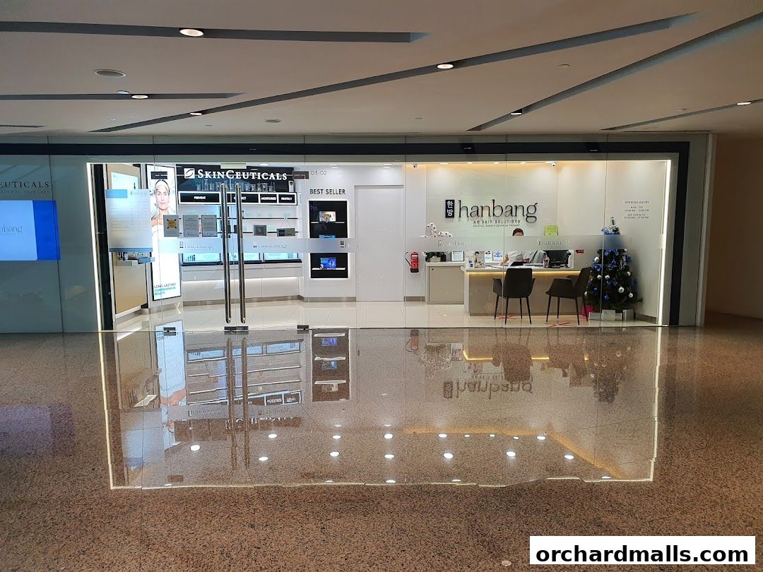 The exterior of Hanbang Skin Solutions, a skincare shop with a modern glass facade.