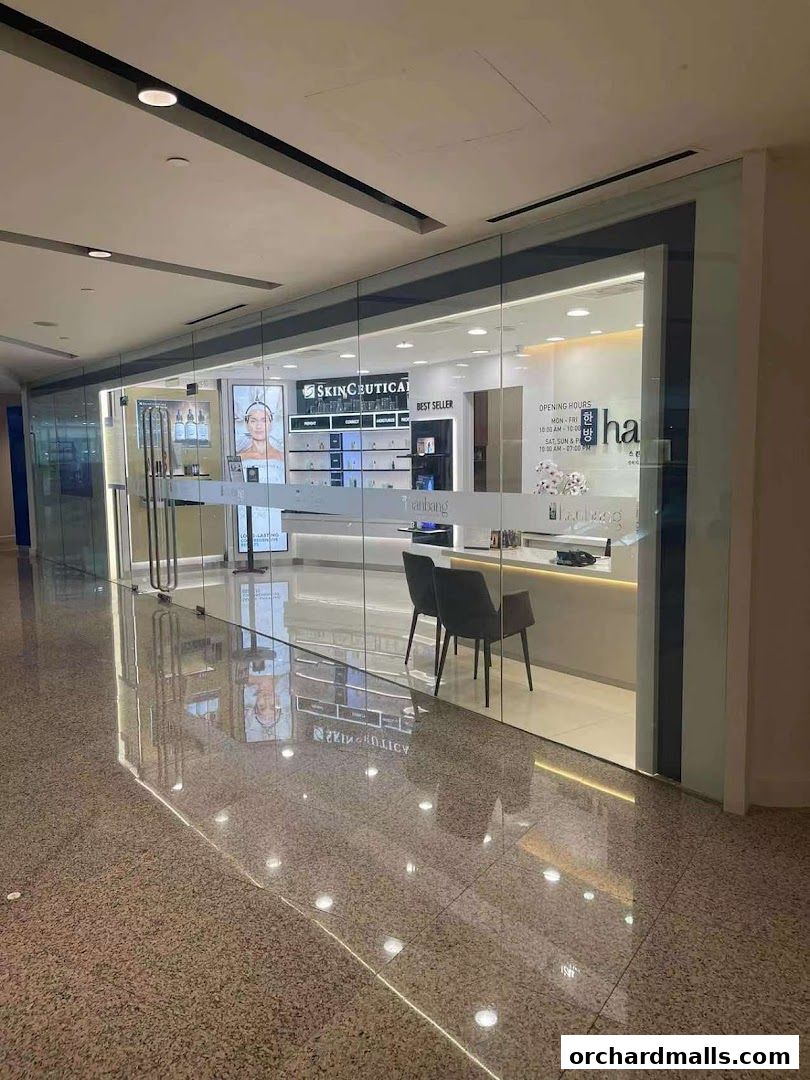 The exterior of Hanbang Skin Solutions, a modern beauty store with glass storefronts.