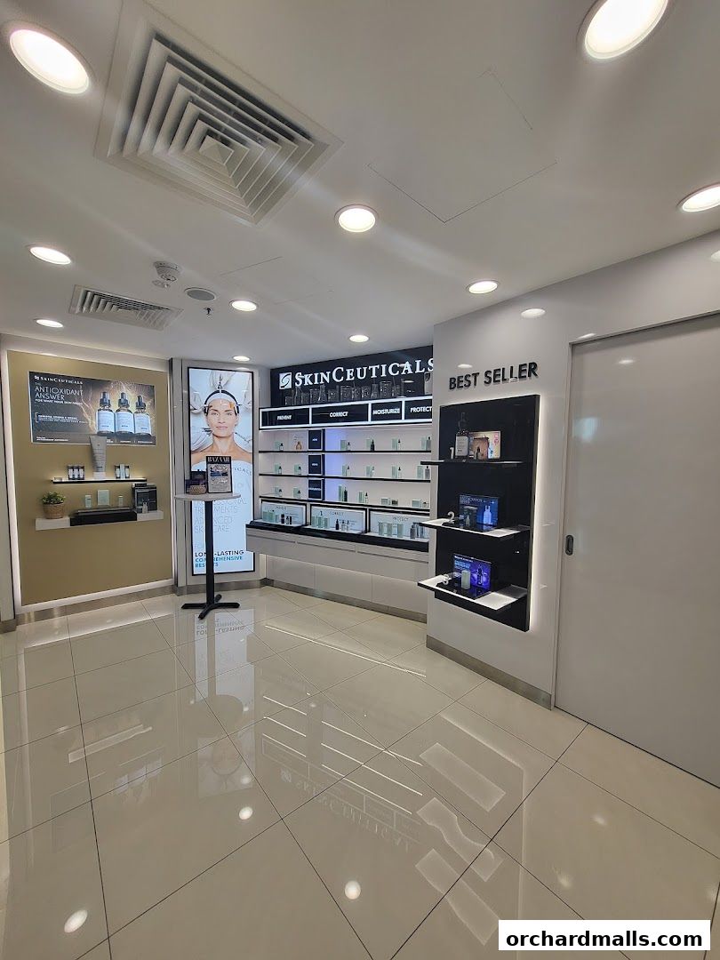 Interior view of a well-lit retail store showcasing skincare products and displays.