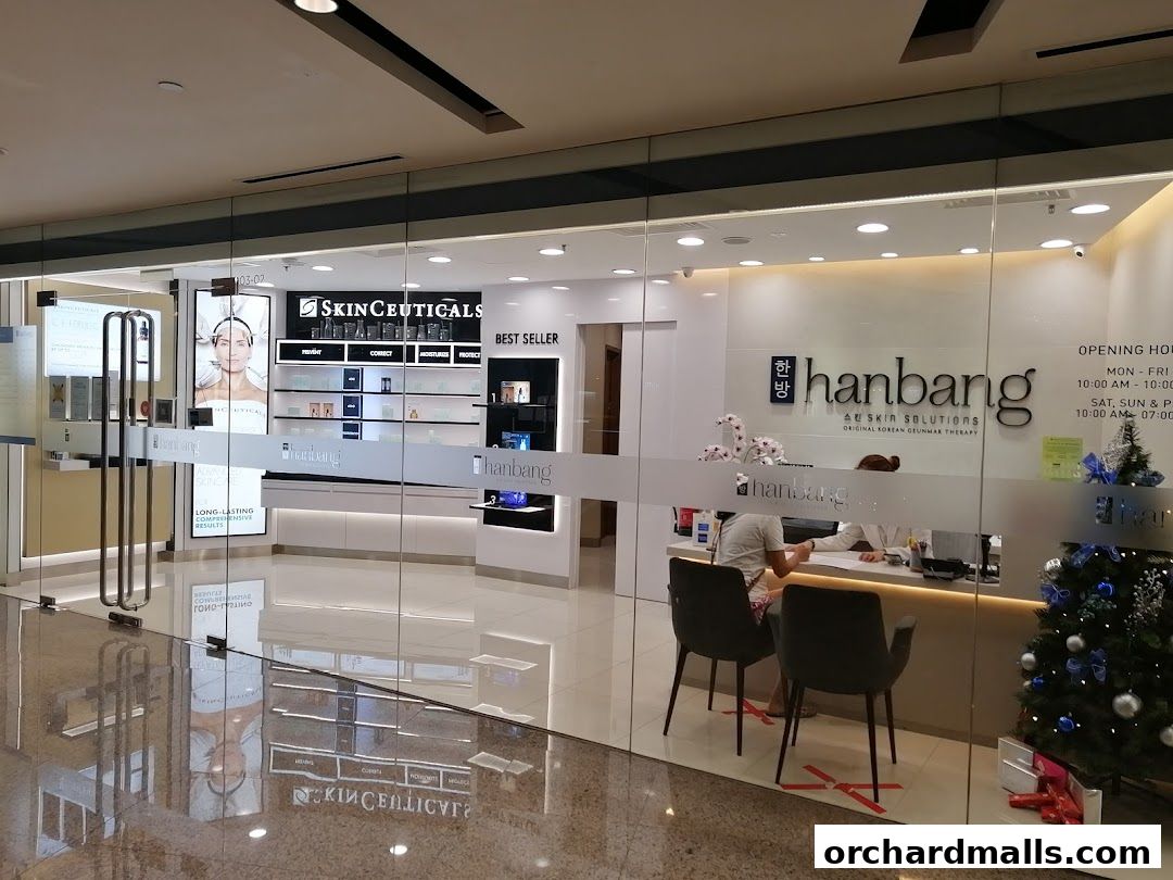The exterior of Hanbang Skin Solutions, a skincare clinic with a modern glass facade.
